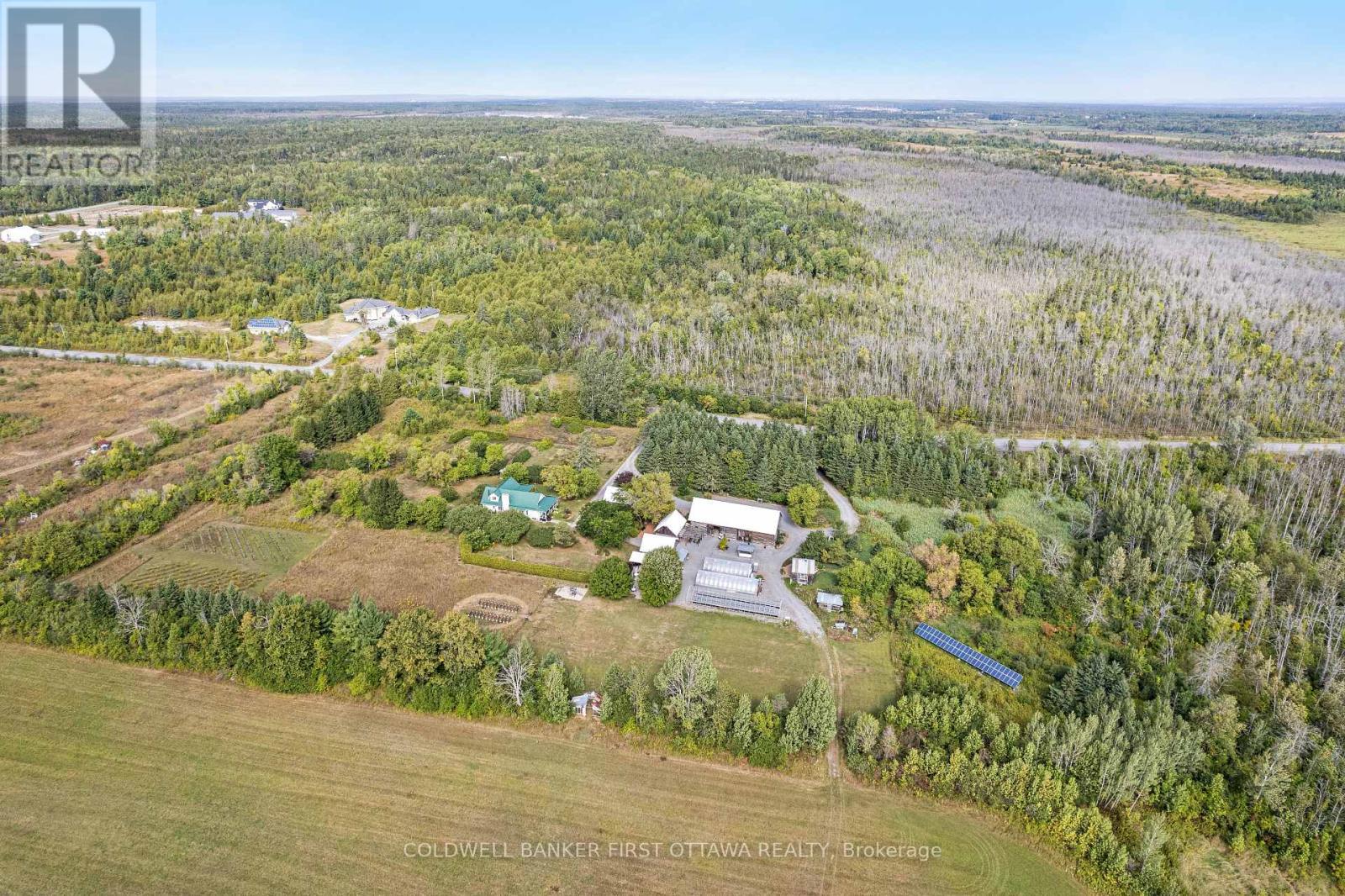View from the back of property. Large solar array - 3840 Old Almonte Road, Ottawa, ON