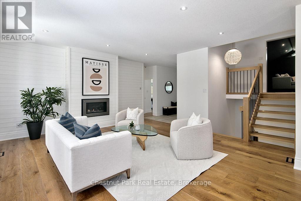 2237 Shore Lane, Wasaga Beach, ON - Indoor Photo Showing Living Room With Fireplace