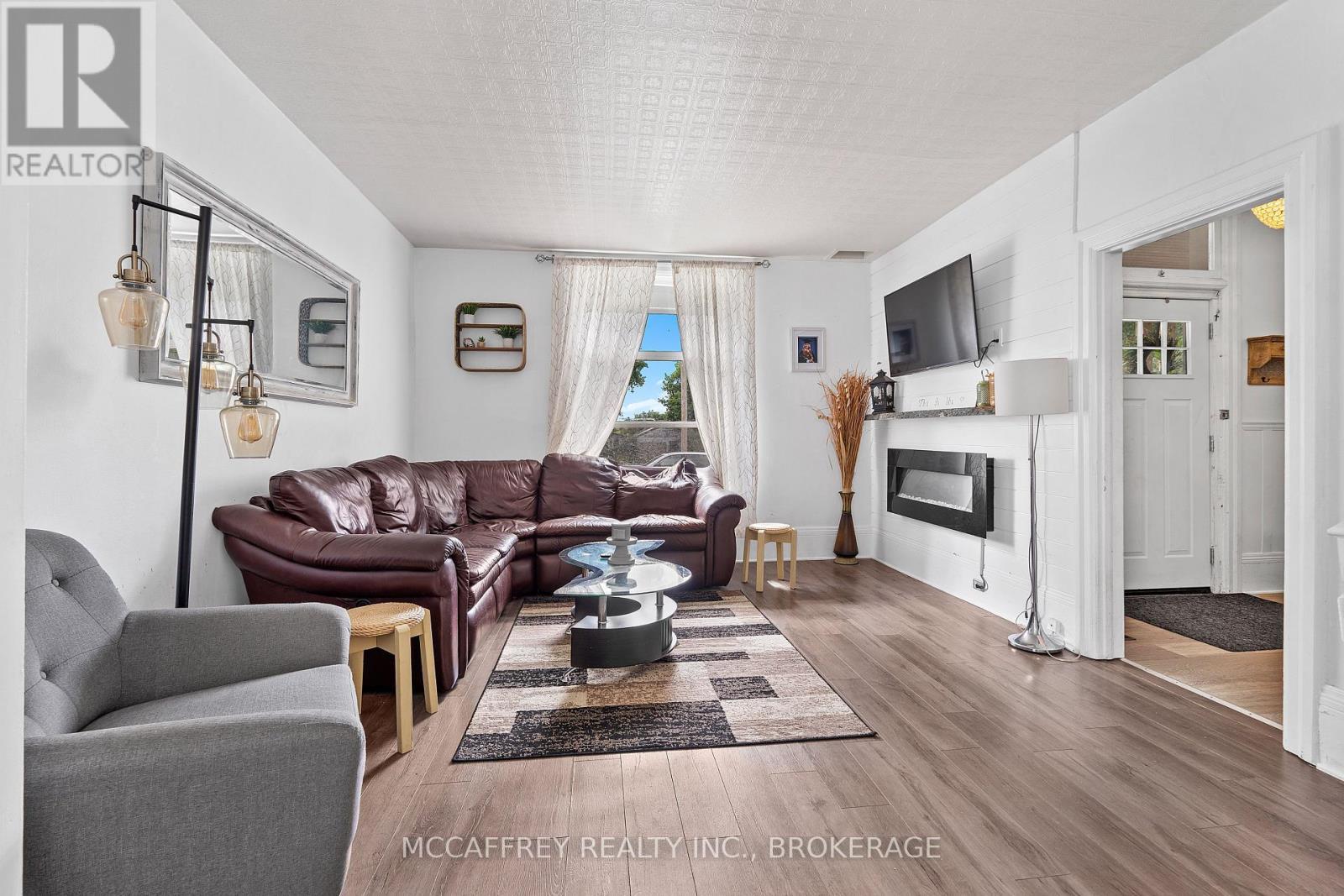 110 Adelaide Street, Front Of Leeds & Seeleys Bay, ON - Indoor Photo Showing Living Room With Fireplace
