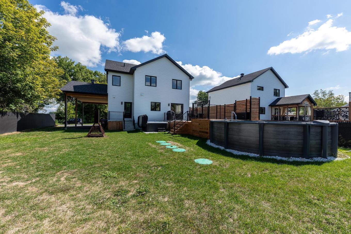 Back facade - 1028 Rue Bissonnette, Saint-Blaise-Sur-Richelieu, QC - Outdoor With Above Ground Pool