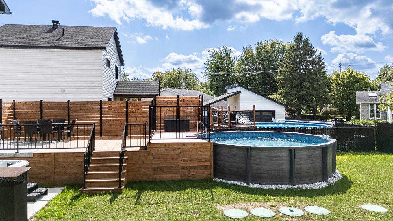 Backyard - 1028 Rue Bissonnette, Saint-Blaise-Sur-Richelieu, QC - Outdoor With Above Ground Pool