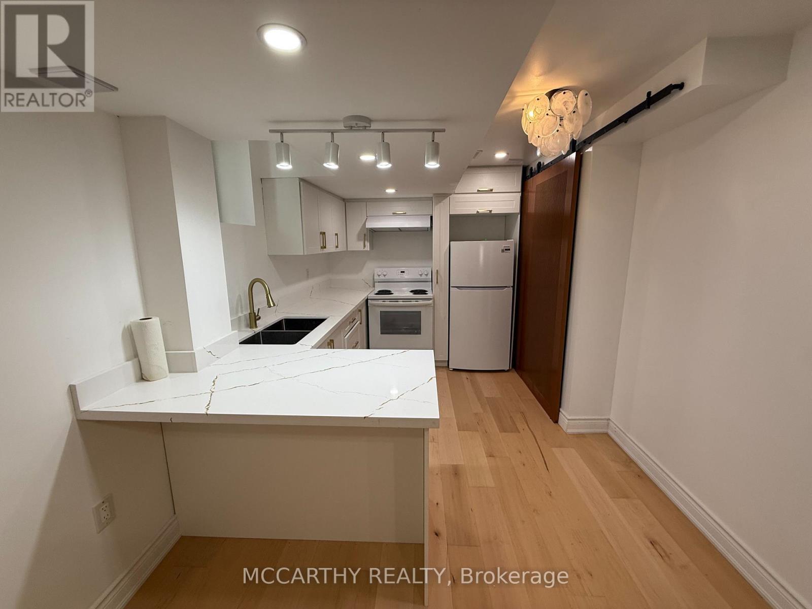 Lower - 480 Black Cherry Crescent, Shelburne, ON - Indoor Photo Showing Kitchen With Double Sink