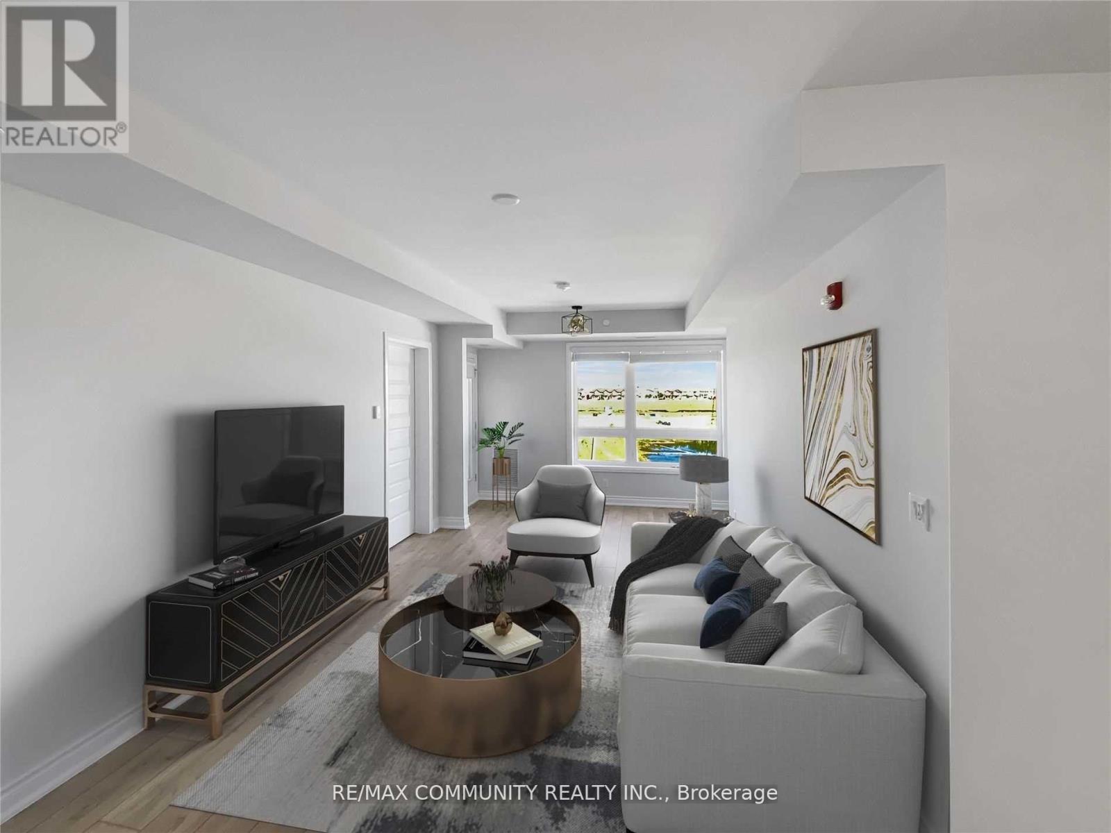 413 - 58 Adam Sellers Street E, Markham, ON - Indoor Photo Showing Living Room