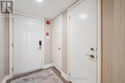 The front foyer with laundry and owner storage -