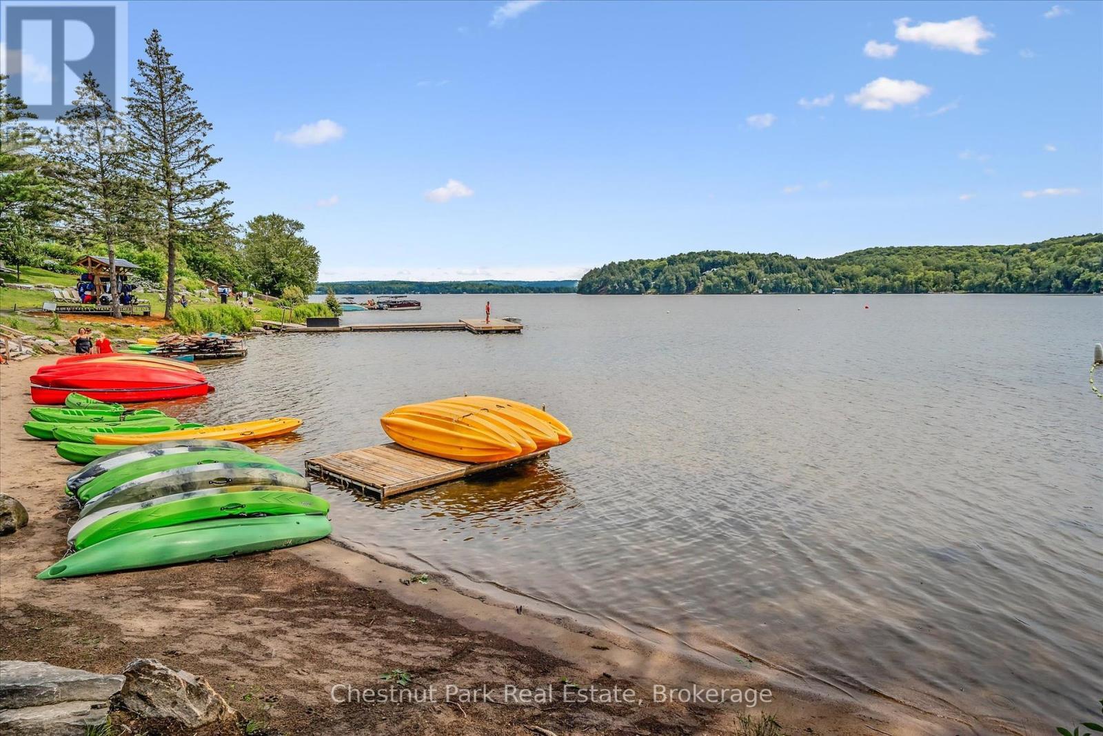 Waterfront activities - 31-303 - 1235 Deerhurst Drive, Huntsville (Chaffey), ON - Outdoor With Body Of Water With View