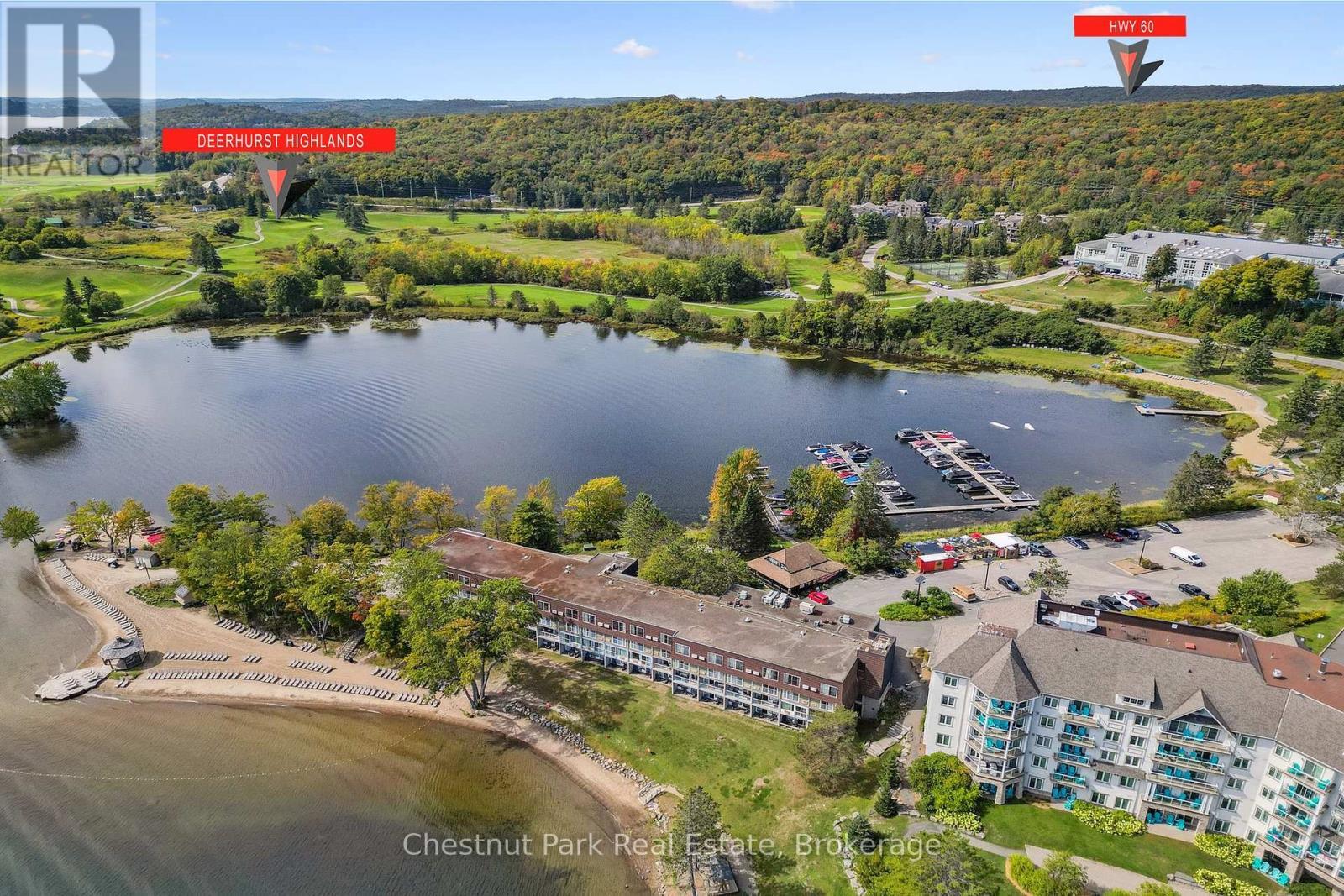 Owners can also rent a slip for their boat - 31-303 - 1235 Deerhurst Drive, Huntsville (Chaffey), ON - Outdoor With Body Of Water With View