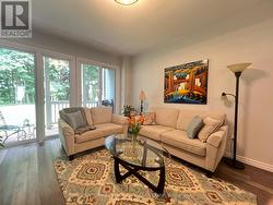 Living room with walk-out to covered porch -