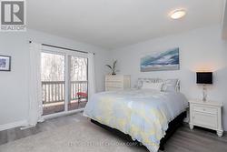 bedroom 2 with walk-out to porch -