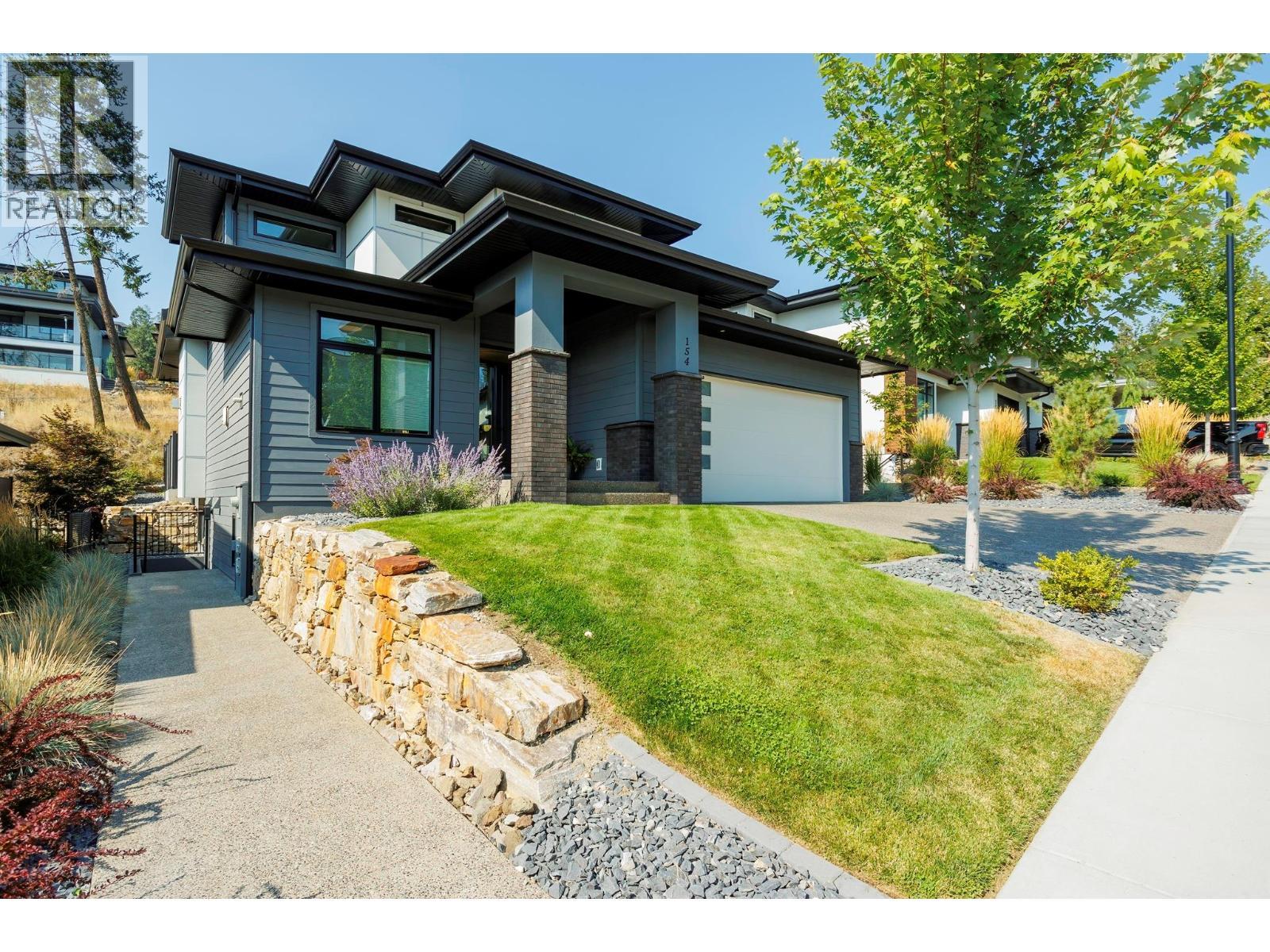 154 Echo Ridge Drive, Kelowna, BC - Outdoor With Facade