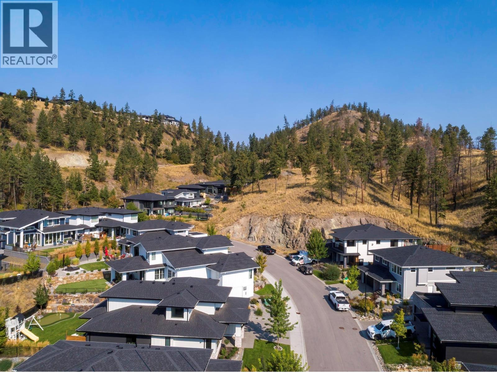 ""Access to km's of hiking trails a block away"" - 154 Echo Ridge Drive, Kelowna, BC - Outdoor With View