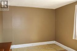 Upstairs bedroom that was a kitchen -