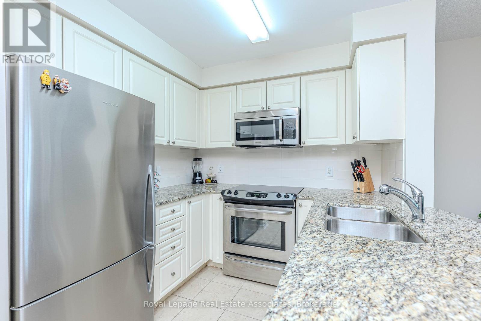 202 - 60 Via Rosedale Way, Brampton, ON - Indoor Photo Showing Kitchen With Stainless Steel Kitchen With Double Sink With Upgraded Kitchen