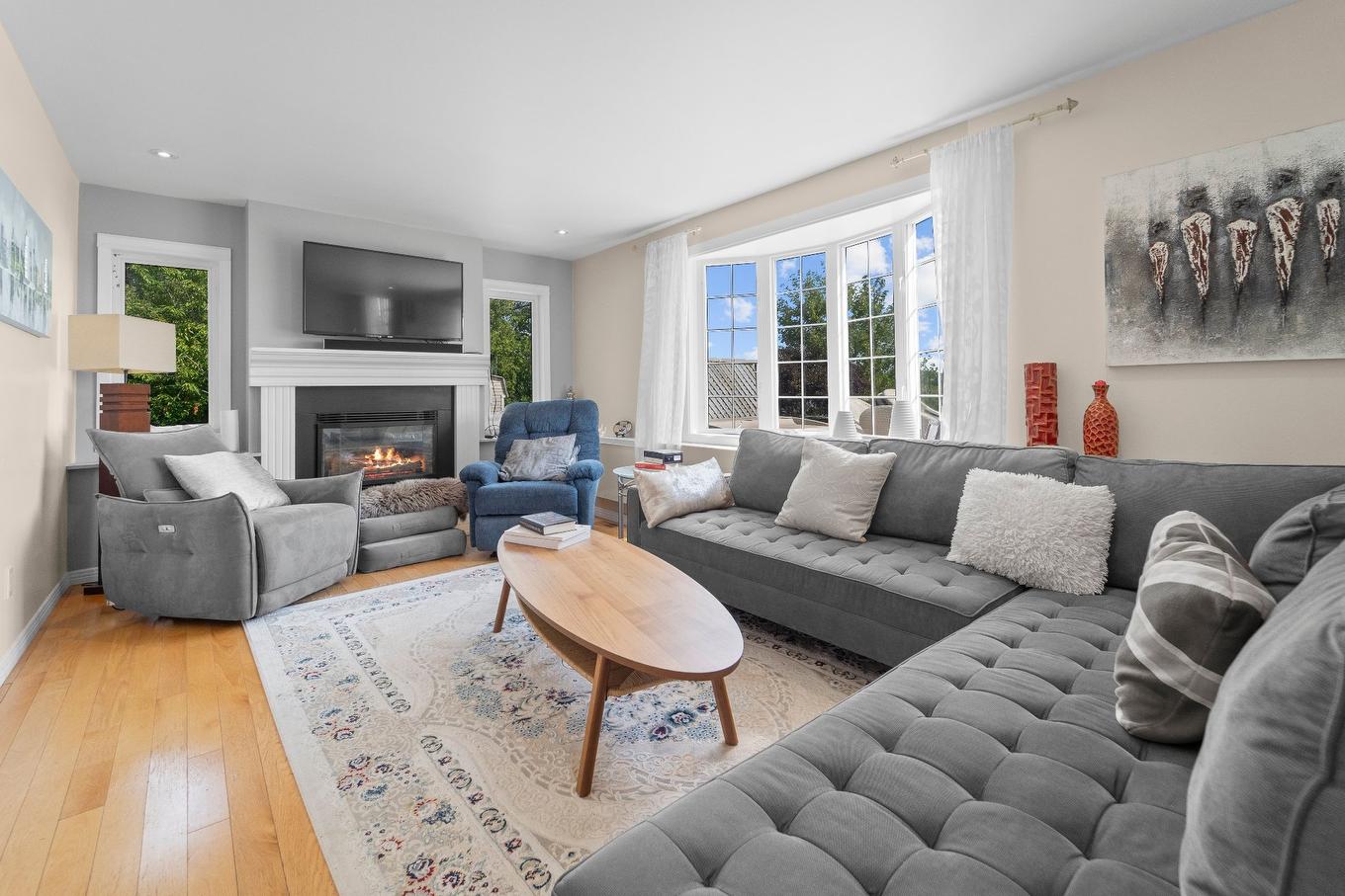 Living room - 7212 Boul. Lévesque E., Laval (Duvernay), QC - Indoor Photo Showing Living Room With Fireplace