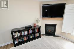 With a cozy new natural gas fire place. -