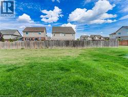 View of yard featuring a residential view -