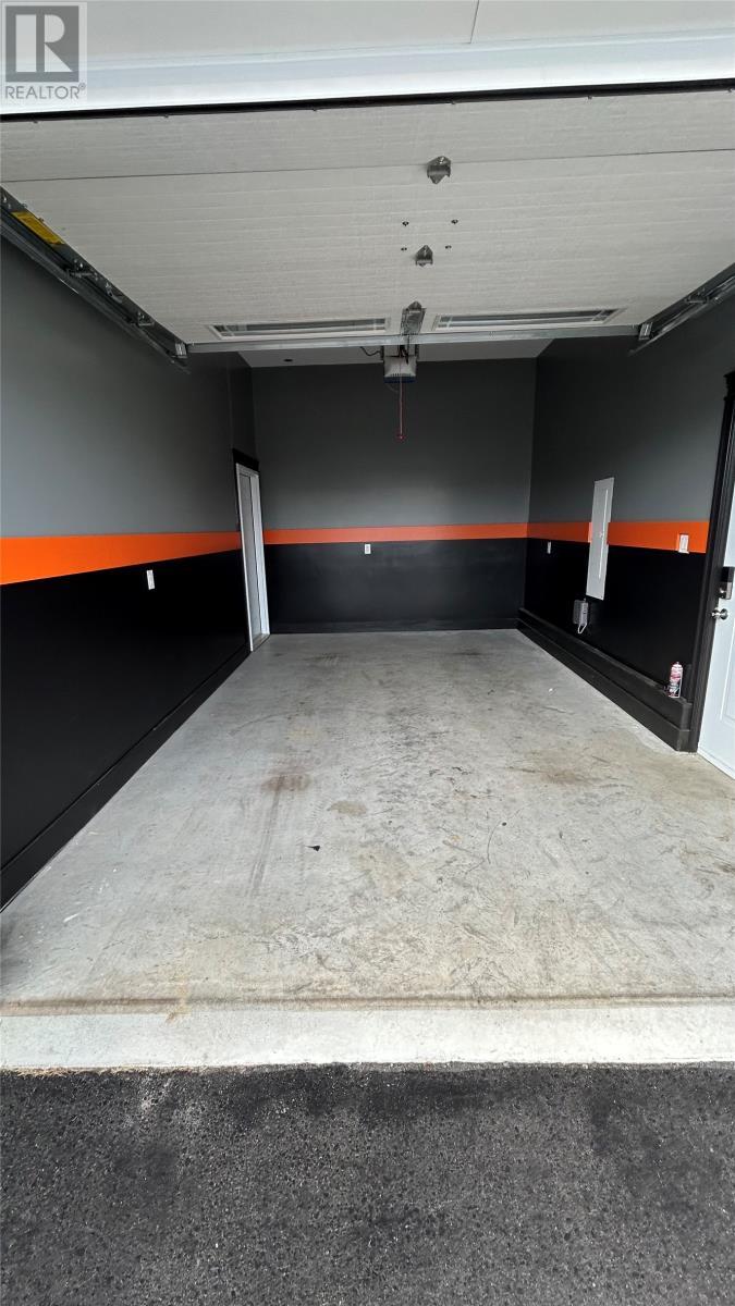 13 - 15 Simon Drive, Stephenville, NL - Indoor Photo Showing Garage