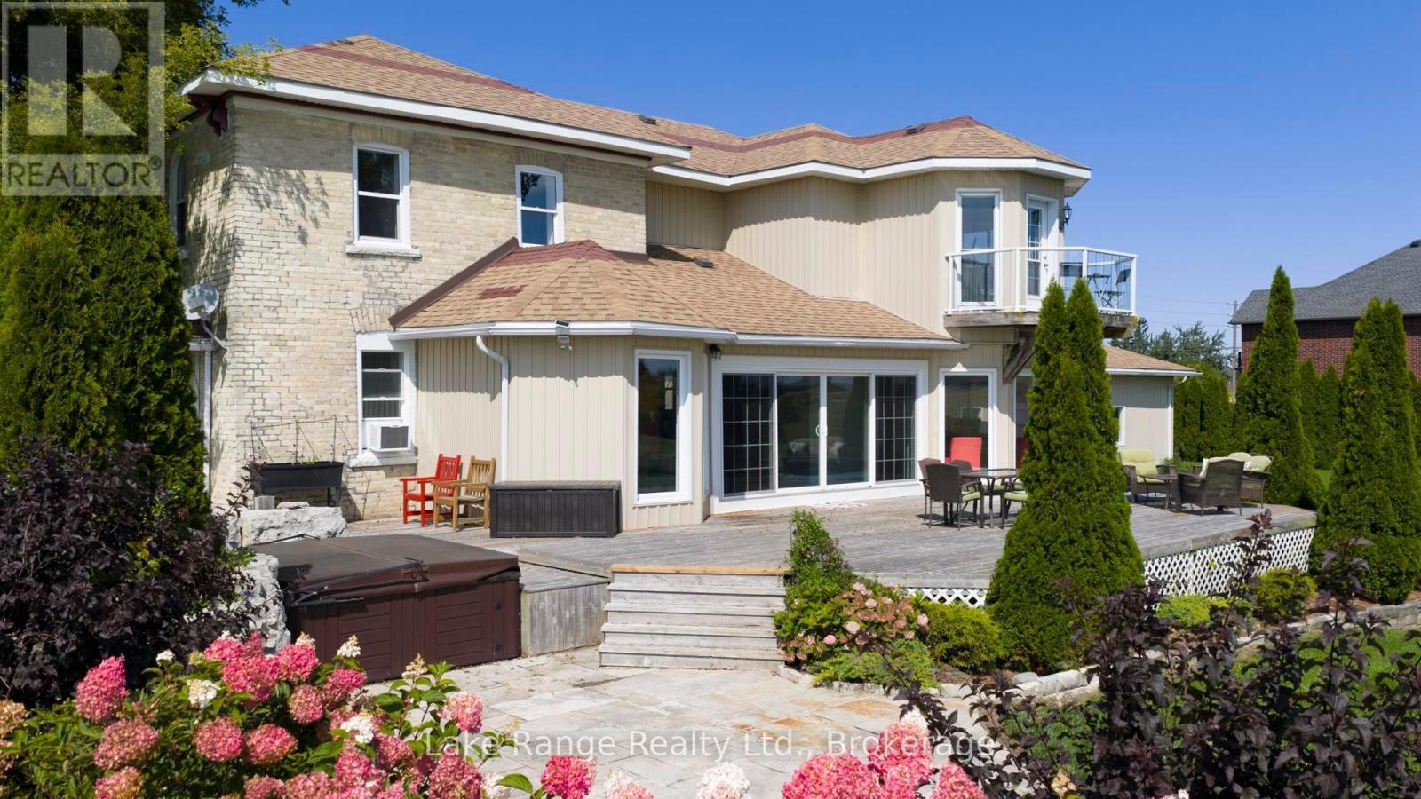 Back deck, stone patio, hot tub - 3622 Highway 21, Kincardine, ON - Outdoor