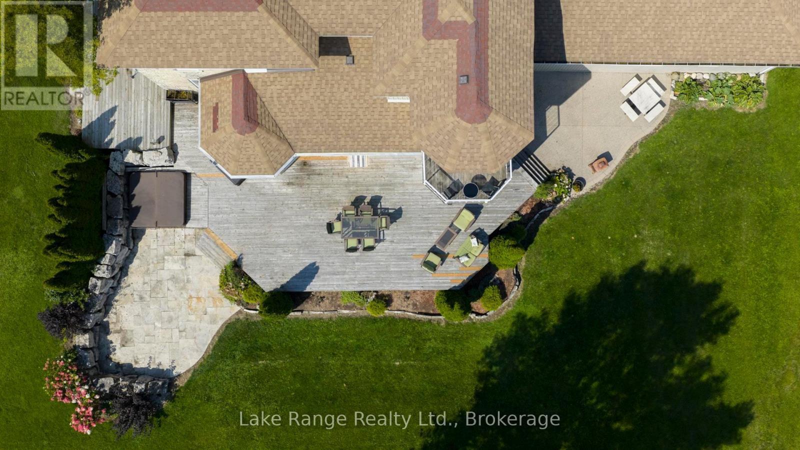 Back deck, stone patio, hot tub, aggregate patio. - 3622 Highway 21, Kincardine, ON - Outdoor