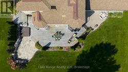 Back deck, stone patio, hot tub, aggregate patio. -