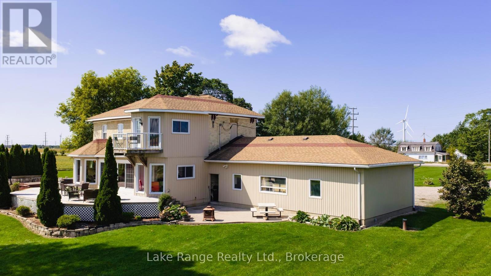 Back, stone patio, hot tub, deck & aggregate patio - 3622 Highway 21, Kincardine, ON - Outdoor