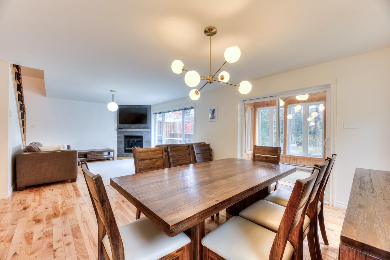 Cuisine - 600 Ch. Olivier, Saint-Côme, QC - Indoor Photo Showing Dining Room With Fireplace