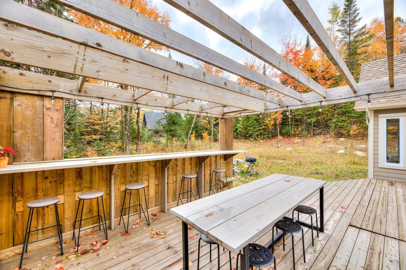 Cour - 600 Ch. Olivier, Saint-Côme, QC - Outdoor With Deck Patio Veranda