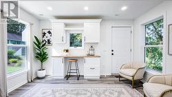 Virtually staged breakfast bar/office space -