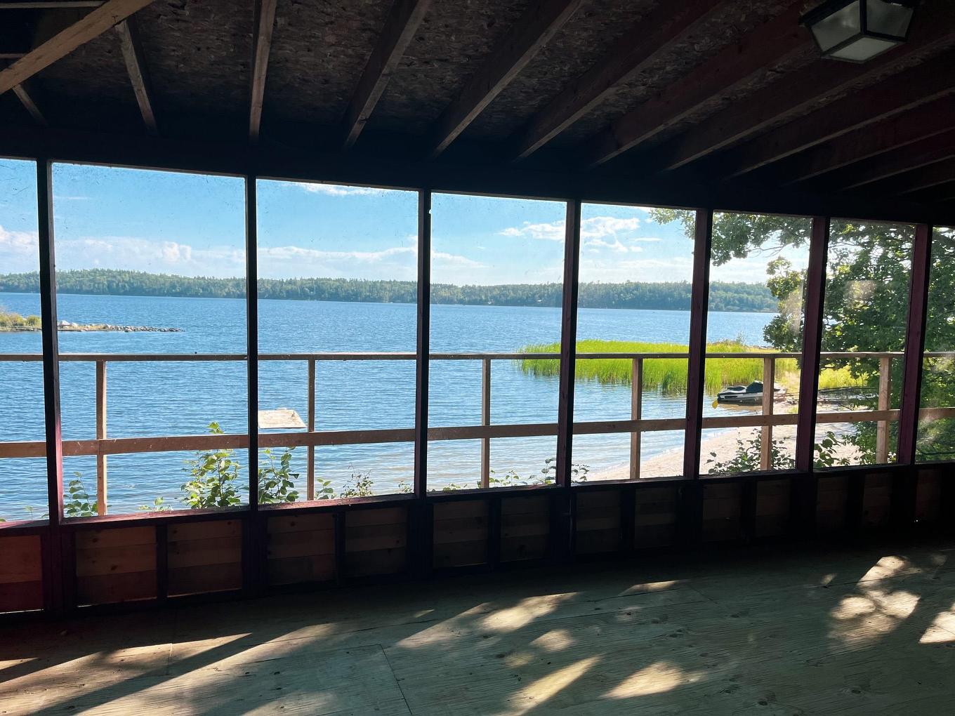 1 Minnesabic Island, District Of Kenora, ON - Indoor Photo Showing Other Room With Body Of Water