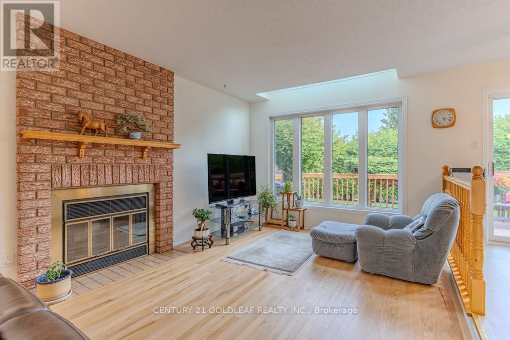 612 Chenier Way, Ottawa, ON - Indoor Photo Showing Living Room With Fireplace