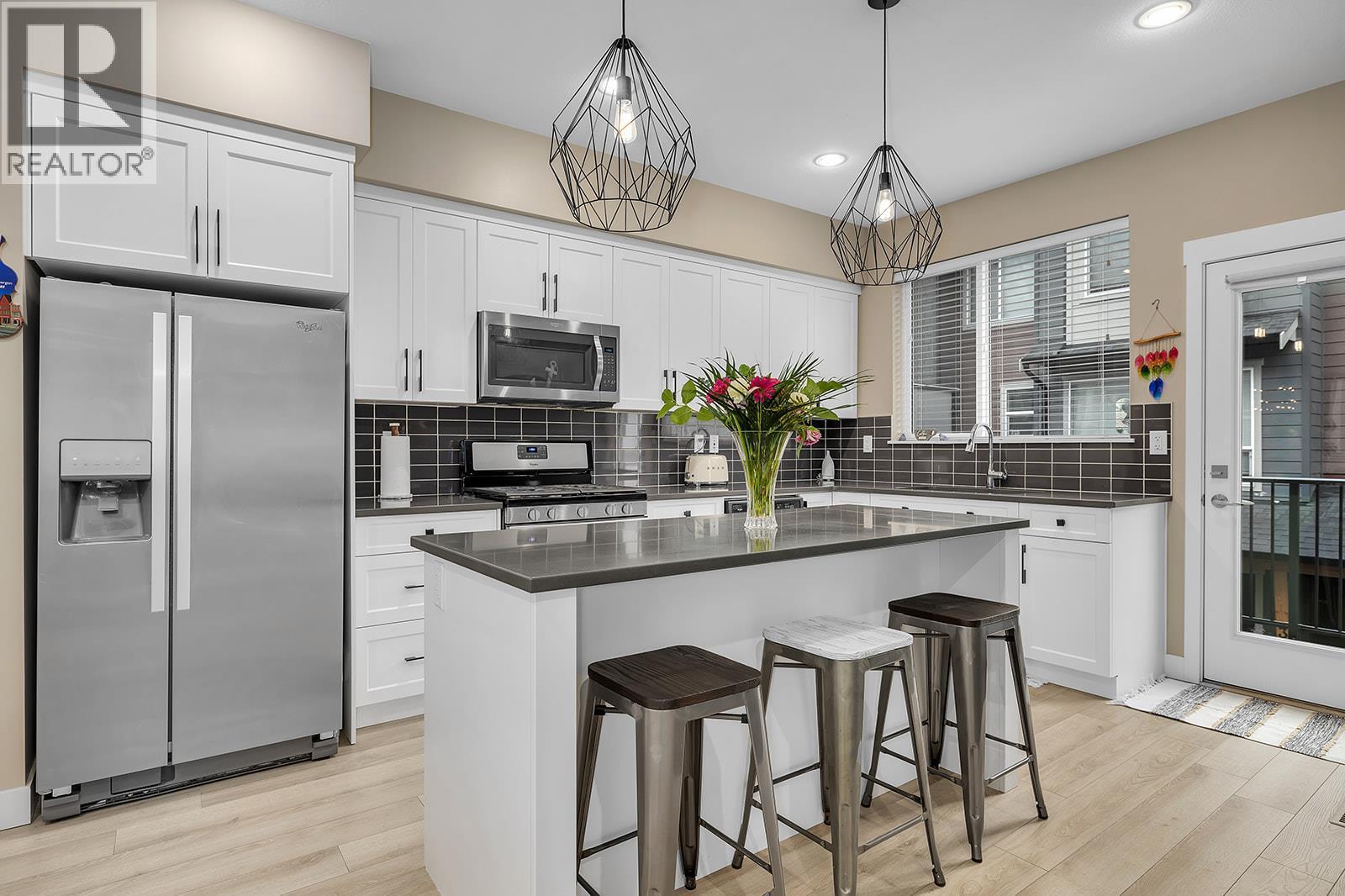 2490 Tuscany Drive Unit# 24, West Kelowna, BC - Indoor Photo Showing Kitchen With Stainless Steel Kitchen With Upgraded Kitchen