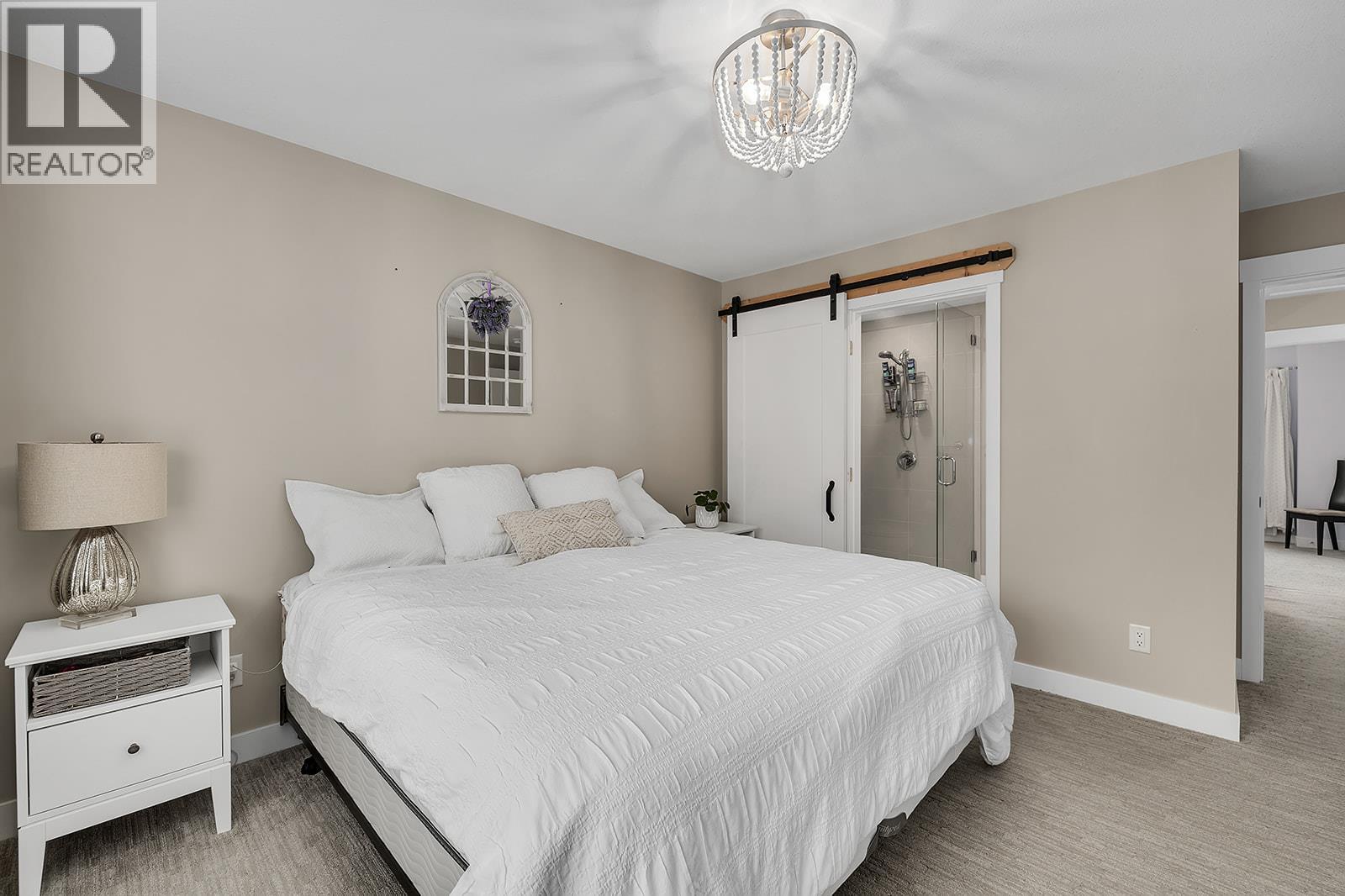 Primary Bedroom - 2490 Tuscany Drive Unit# 24, West Kelowna, BC - Indoor Photo Showing Bedroom