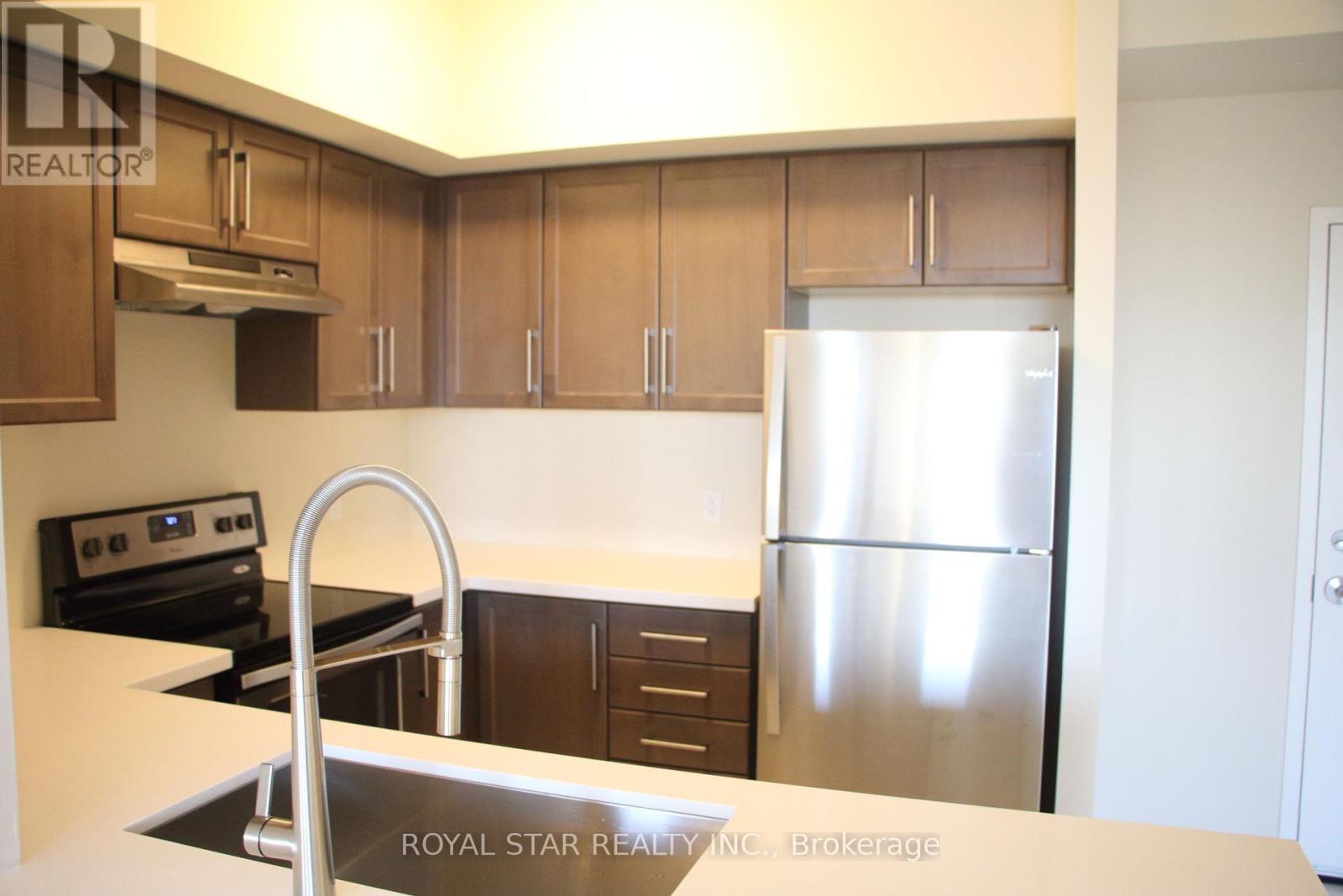 410 - 650 Sauve Street, Milton, ON - Indoor Photo Showing Kitchen
