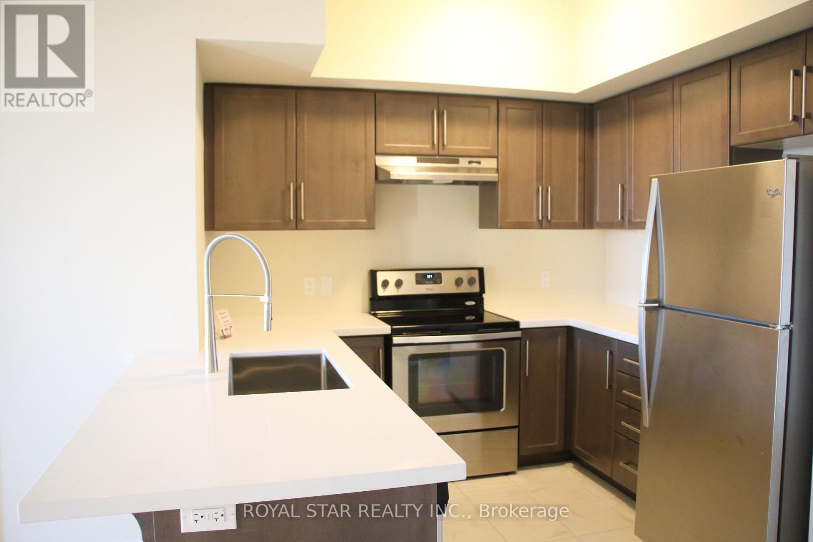 410 - 650 Sauve Street, Milton, ON - Indoor Photo Showing Kitchen With Upgraded Kitchen