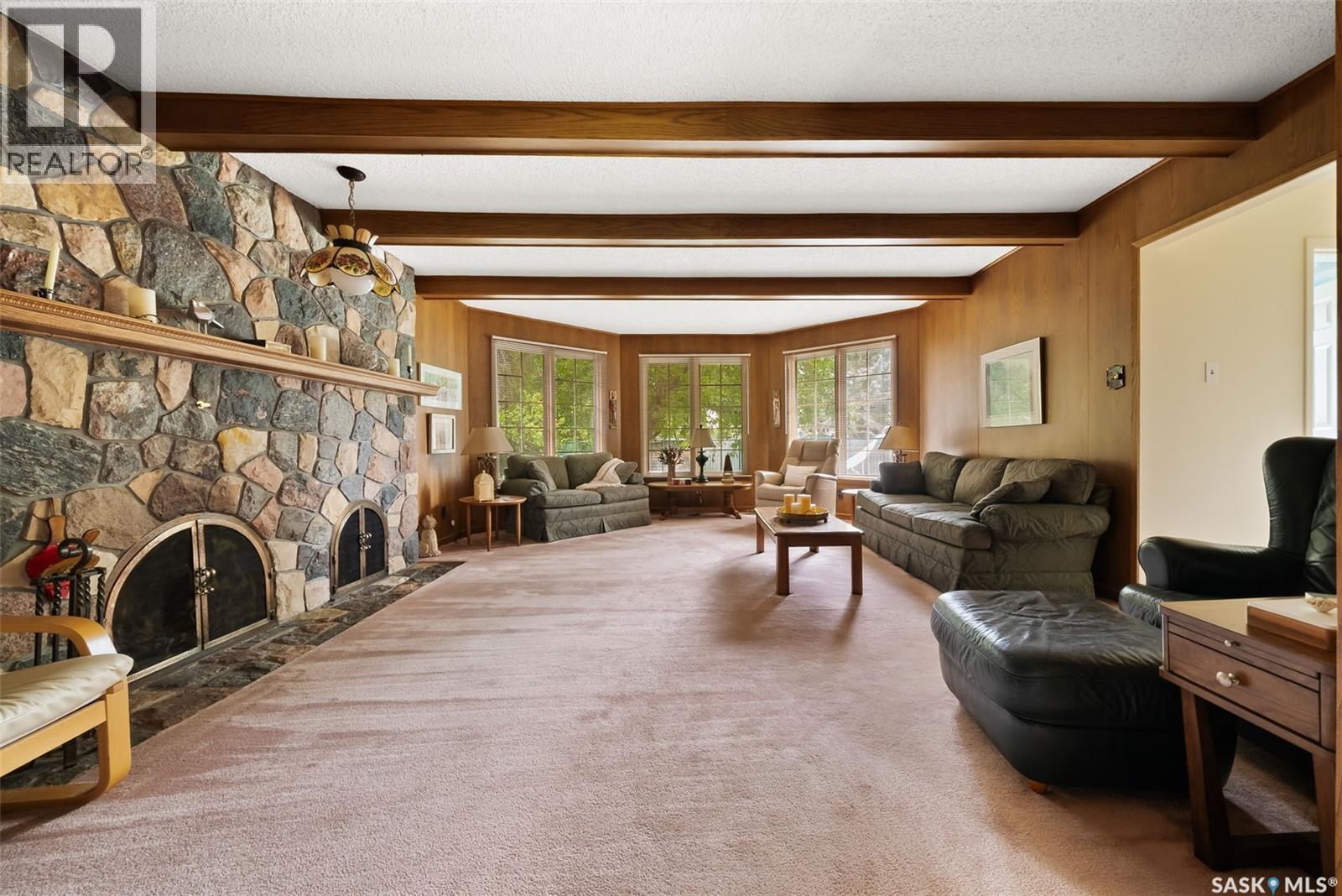 70 Lowry Place, Regina, SK - Indoor Photo Showing Living Room With Fireplace