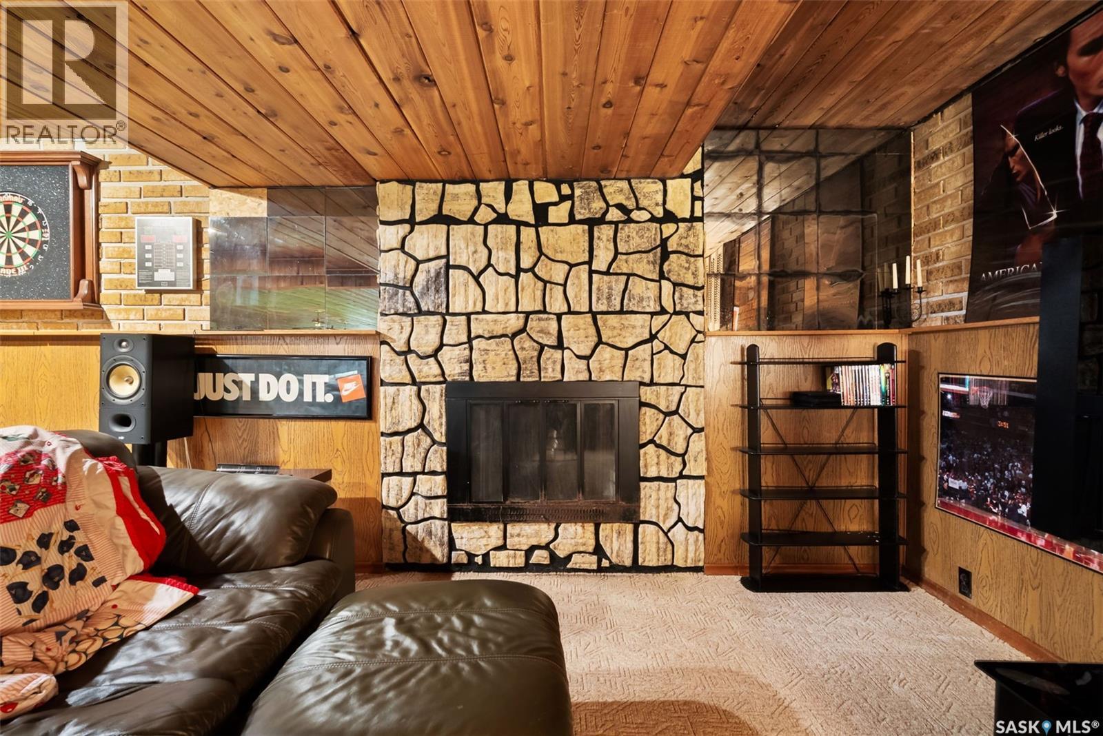 70 Lowry Place, Regina, SK - Indoor Photo Showing Other Room With Fireplace