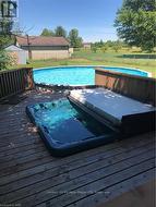 beautiful pool and sunk in deck hottub -