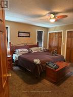 master bedroom with ensuite and his & her closets -