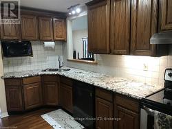 Look at this kitchen! Granite counters. -