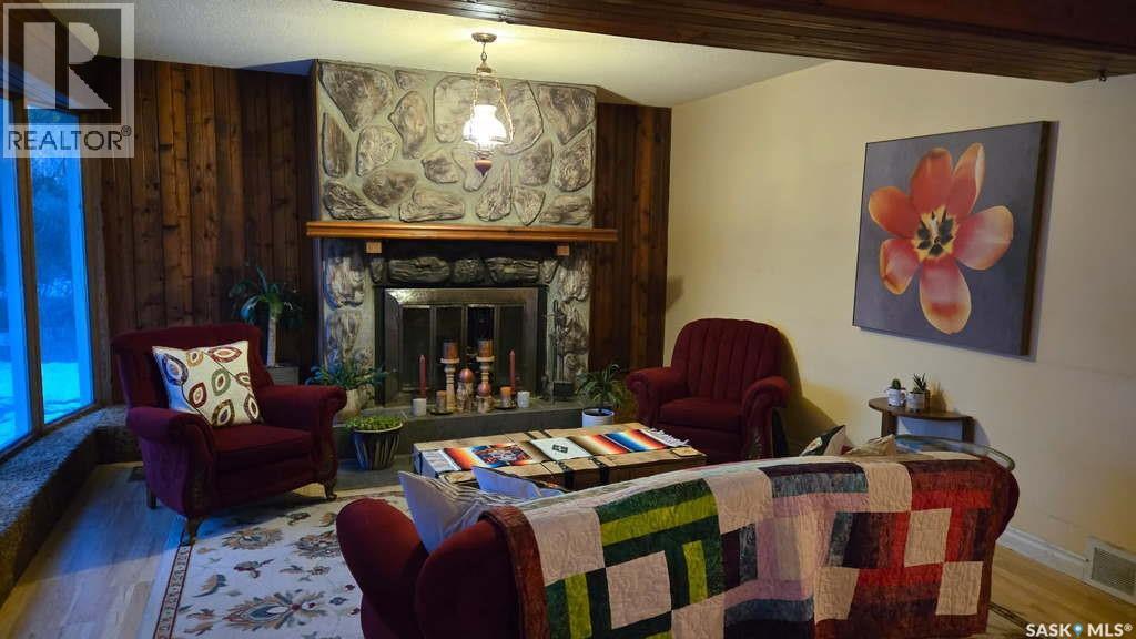 Rural Address, Rose Valley, SK - Indoor Photo Showing Living Room With Fireplace
