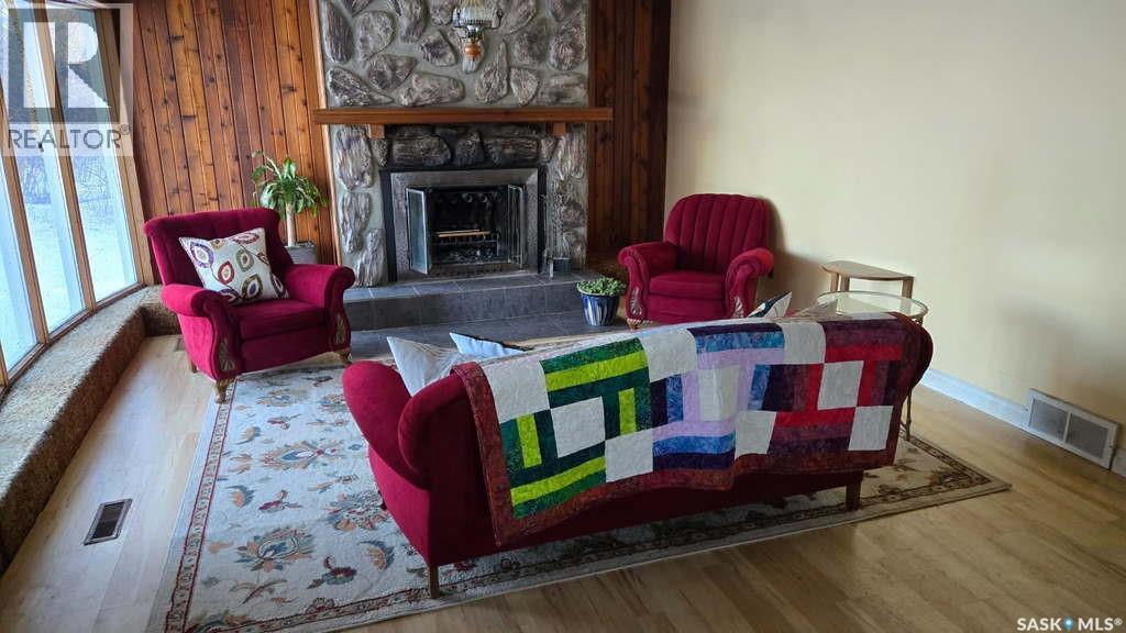 Rural Address, Rose Valley, SK - Indoor Photo Showing Living Room With Fireplace