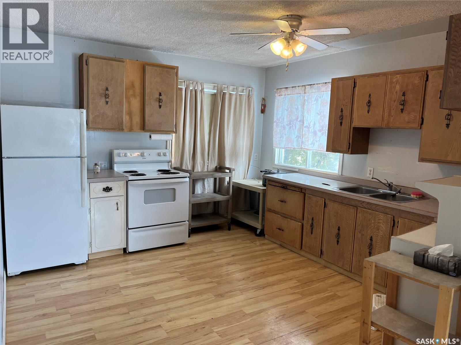 Rural Address, Rose Valley, SK - Indoor Photo Showing Kitchen With Double Sink