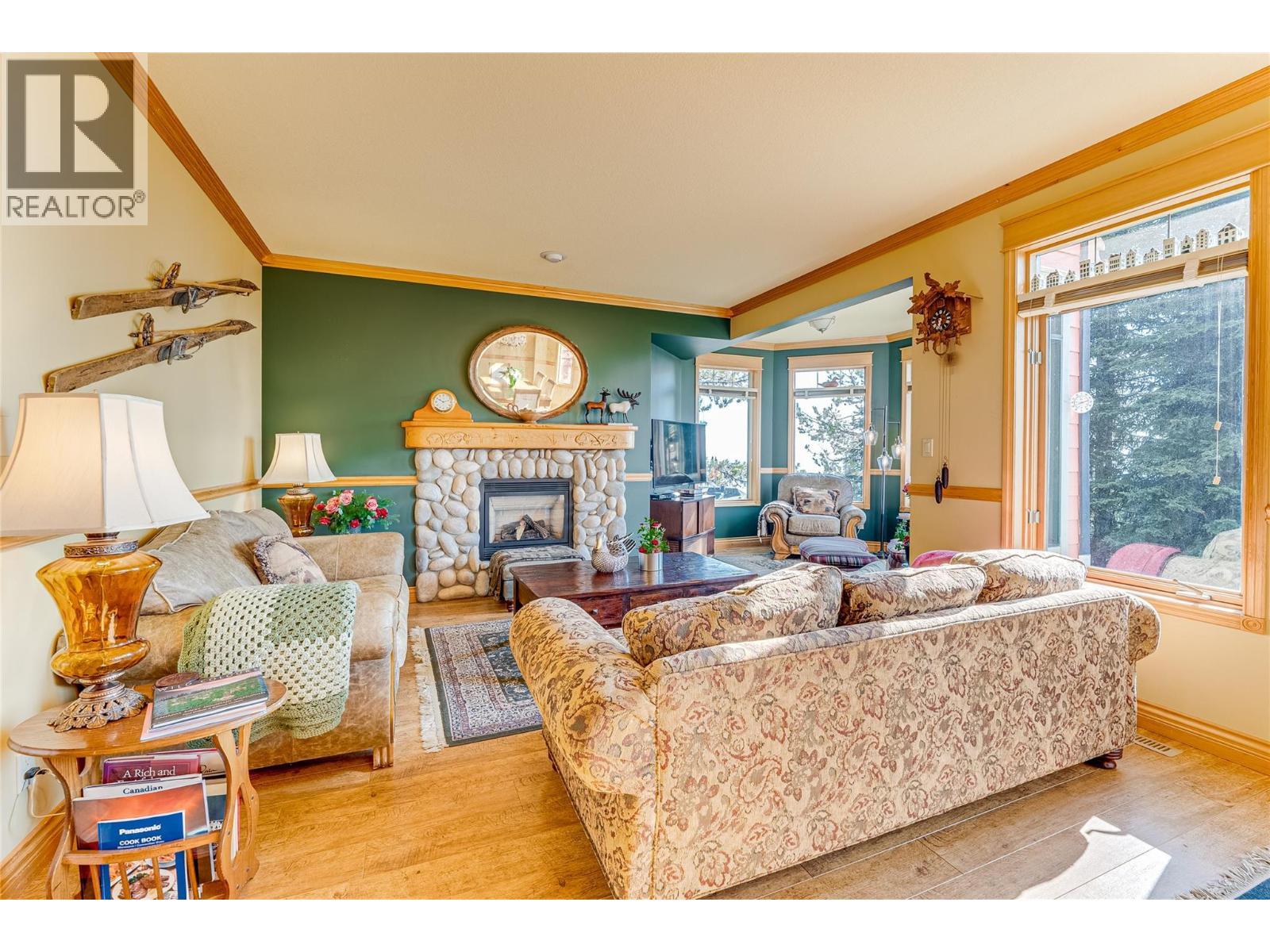 635 Monashee Road Unit# 8, Silver Star, BC - Indoor Photo Showing Living Room With Fireplace