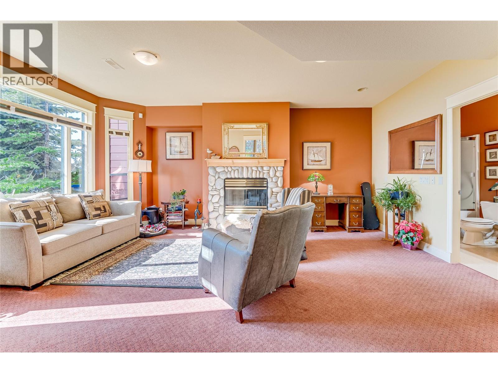 635 Monashee Road Unit# 8, Silver Star, BC - Indoor Photo Showing Living Room With Fireplace