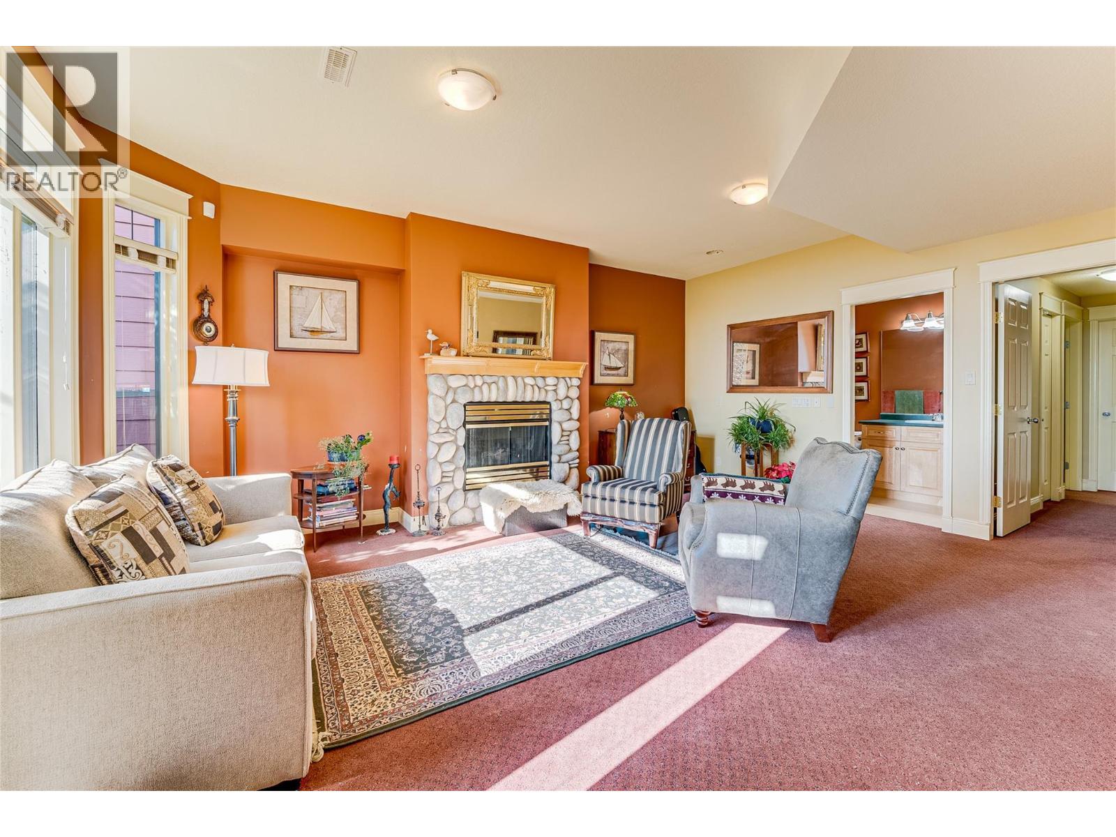 635 Monashee Road Unit# 8, Silver Star, BC - Indoor Photo Showing Living Room With Fireplace