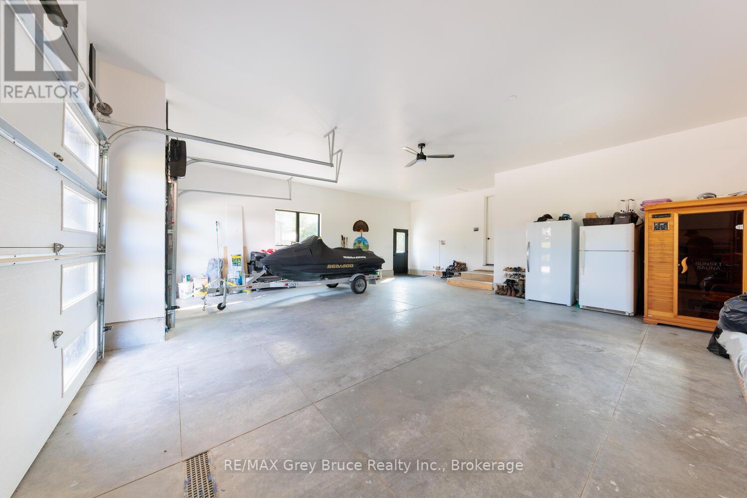 Attached 3 car garage - 117 Almur Drive, Georgian Bluffs, ON - Indoor Photo Showing Garage