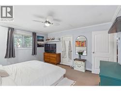 MASTER BEDROOM - Doors lead to Sunroom and Main Bathroom! -
