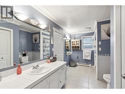 MAIN BATHROOM - Large Main Bathroom with tubs/shower and lots of vanity space! -