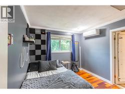 BEDROOM #2 - Nicely-Sized second bedroom, efficient heat pump provides quiet heating and cooling! -