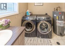 BATHROOM/LAUNDRY - Great Powder room and laundry right off the mudroom and close to kitchen! -