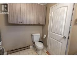 Great Powder room and laundry right off the mudroom and close to kitchen! Lots of Storage! -